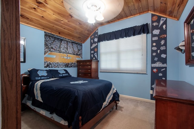 bedroom featuring light colored carpet, lofted ceiling, and wood ceiling