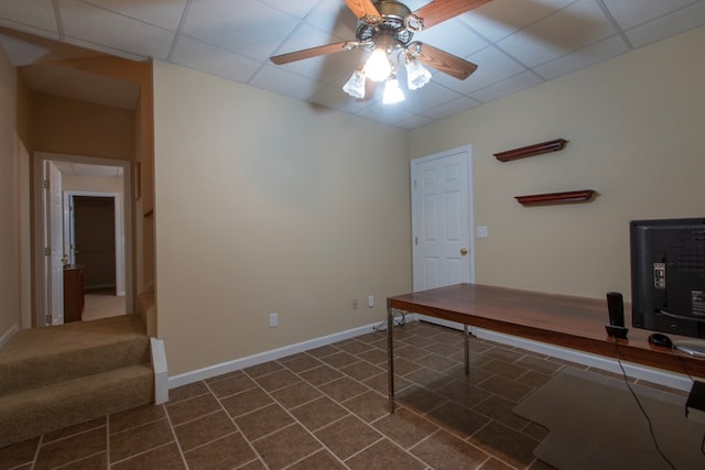 office space with ceiling fan and a paneled ceiling