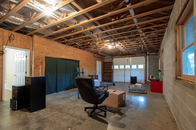 interior space featuring concrete flooring