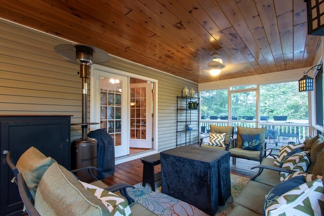 sunroom with wood ceiling