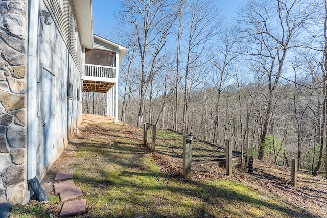 425 Tarheel Dr W, Murphy, NC 28906 - view of yard with a forest view and a sunroom