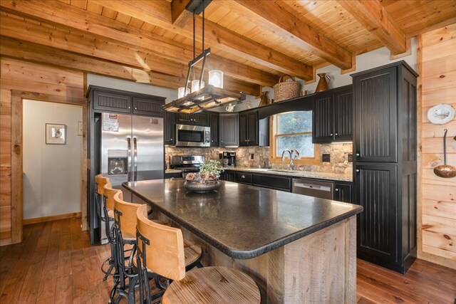 510 Gallery Ct, Ellijay, GA 30540 - kitchen featuring appliances with stainless steel finishes, a wooden ceiling with exposed beams, dark wood-style flooring, decorative backsplash, and hanging light fixtures