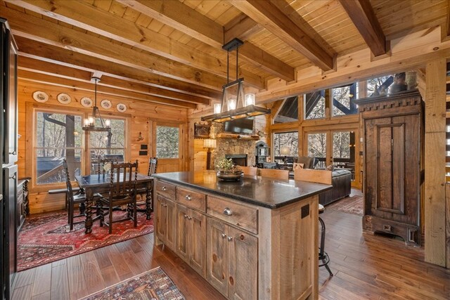 510 Gallery Ct, Ellijay, GA 30540 - kitchen with a wood ceiling with exposed beams, dark countertops, dark wood-style flooring, open floor plan, and a center island