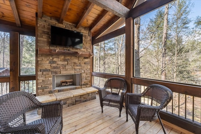 510 Gallery Ct, Ellijay, GA 30540 - sunroom / solarium featuring an outdoor stone fireplace and healthy amount of natural light