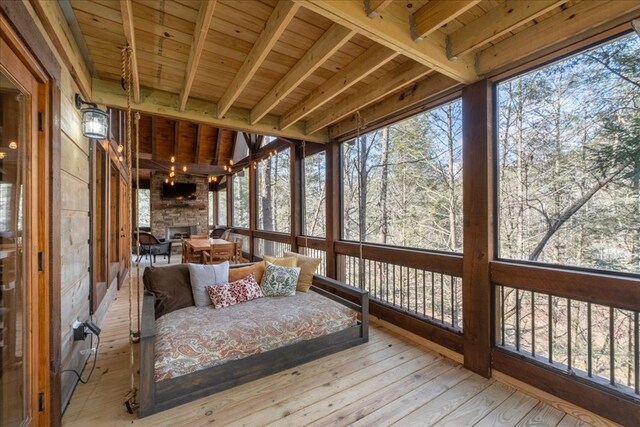 510 Gallery Ct, Ellijay, GA 30540 - sunroom with plenty of natural light and a fireplace