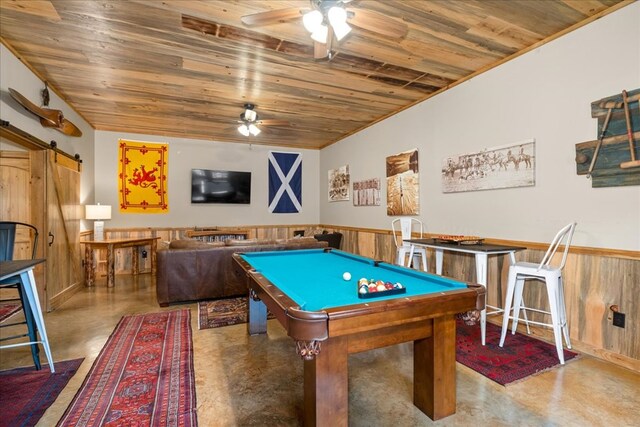 510 Gallery Ct, Ellijay, GA 30540 - recreation room featuring a ceiling fan, wood ceiling, concrete flooring, a barn door, and a wainscoted wall