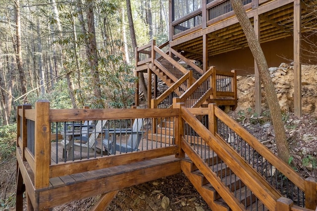 510 Gallery Ct, Ellijay, GA 30540 - deck featuring stairway and a wooded view