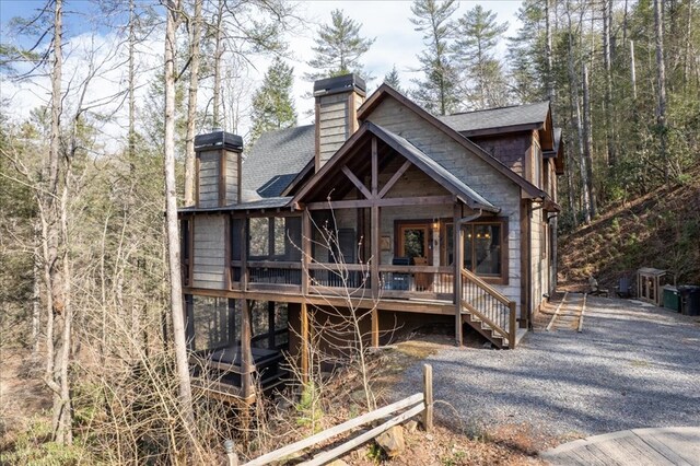510 Gallery Ct, Ellijay, GA 30540 - view of front of house featuring a chimney, roof with shingles, and a porch