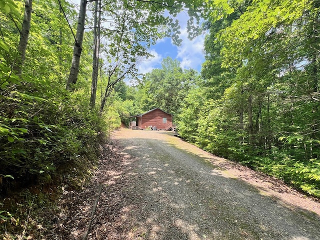 384 Shadow Pines Dr, Murphy, NC 28906 - view of dirt / gravel driveway featuring a wooded view