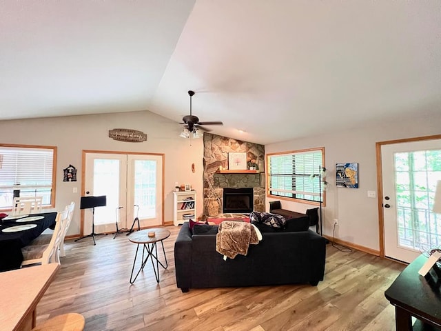 384 Shadow Pines Dr, Murphy, NC 28906 - living room featuring light wood-style floors, a ceiling fan, vaulted ceiling, and healthy amount of natural light