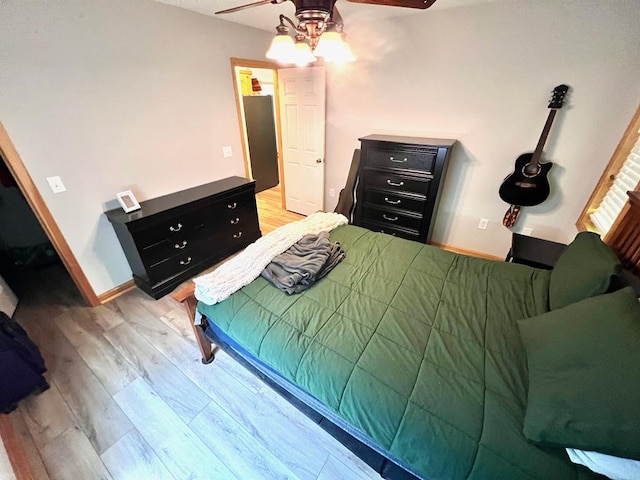 384 Shadow Pines Dr, Murphy, NC 28906 - bedroom featuring light wood-style flooring and a ceiling fan