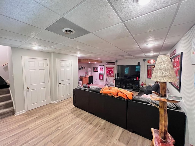 384 Shadow Pines Dr, Murphy, NC 28906 - living area with wood finished floors, a drop ceiling, and stairway