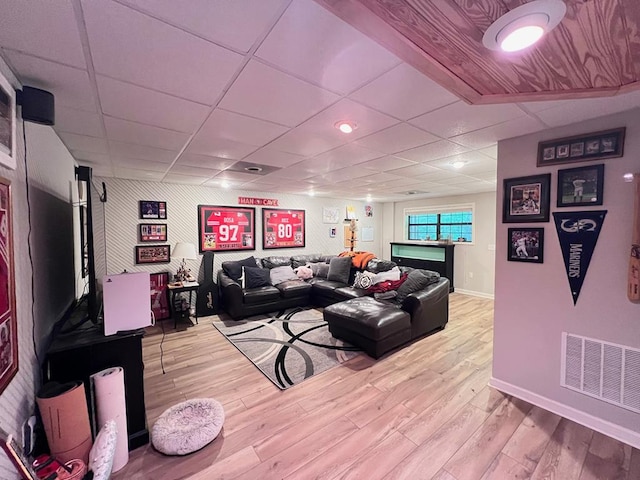 384 Shadow Pines Dr, Murphy, NC 28906 - living room with baseboards, a drop ceiling, light wood-style flooring, and bar