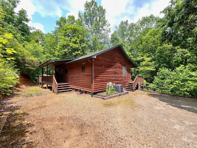 384 Shadow Pines Dr, Murphy, NC 28906 - view of home's exterior with cooling unit and a wooden deck
