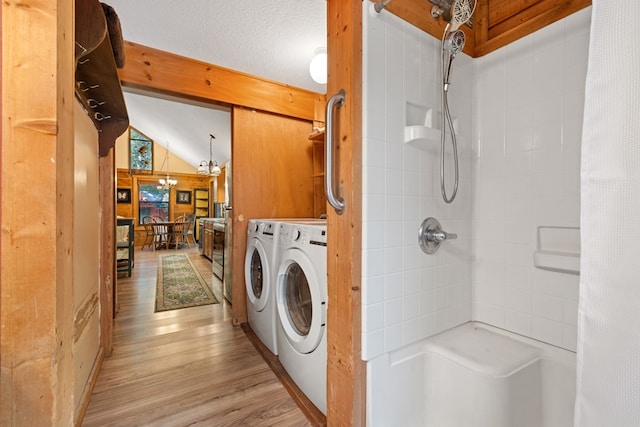 881 Sawyer Cove Rd, Hayesville, NC 28904 - laundry area with separate washer and dryer and light wood-style flooring