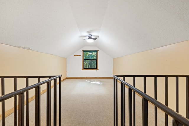 881 Sawyer Cove Rd, Hayesville, NC 28904 - bonus room featuring carpet flooring, vaulted ceiling, and a textured ceiling