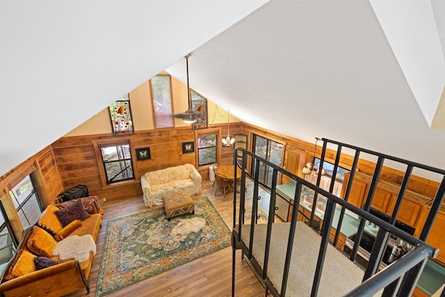 881 Sawyer Cove Rd, Hayesville, NC 28904 - living area featuring wooden walls, wood finished floors, and vaulted ceiling