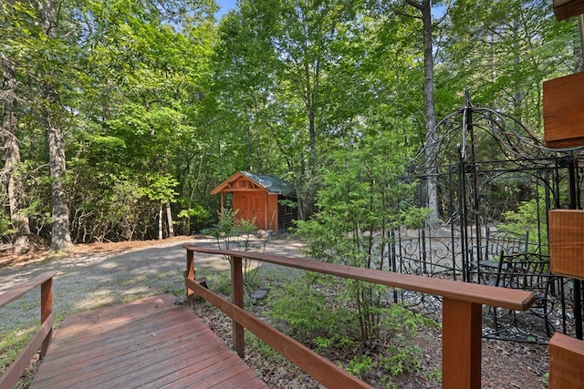 881 Sawyer Cove Rd, Hayesville, NC 28904 - wooden terrace featuring a storage unit