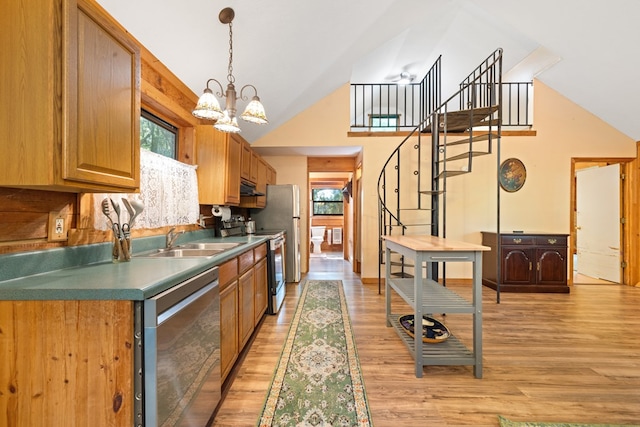 881 Sawyer Cove Rd, Hayesville, NC 28904 - kitchen featuring stainless steel appliances, high vaulted ceiling, a chandelier, light wood finished floors, and under cabinet range hood