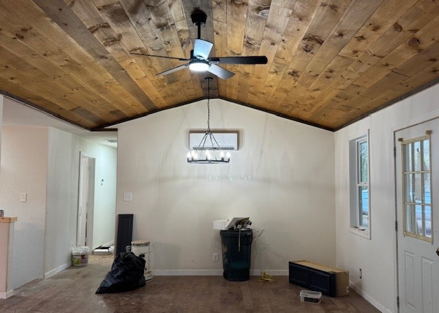 entrance foyer featuring ceiling fan with notable chandelier, vaulted ceiling, a wall mounted AC, and wood ceiling