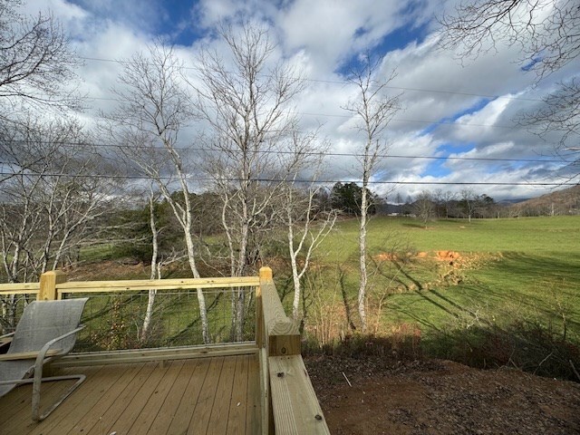 view of yard with a wooden deck