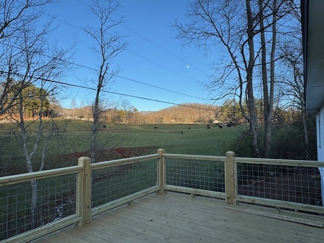 deck featuring a rural view