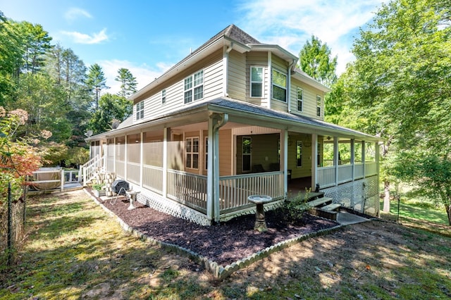 view of property exterior featuring a porch