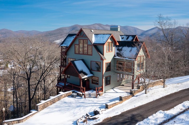 view of front of home with a mountain view