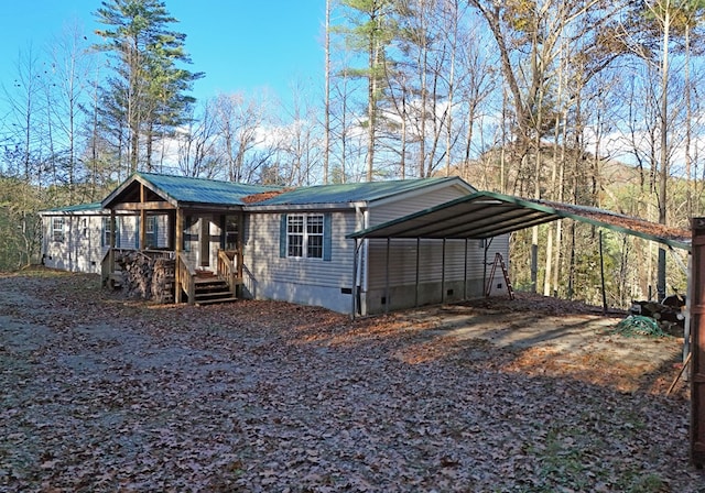 exterior space with a carport