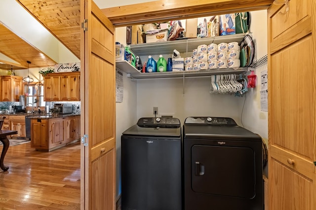 2487 Newport Dr, Ellijay, GA 30540 - laundry area with light wood-style floors, separate washer and dryer, laundry area, and a sink