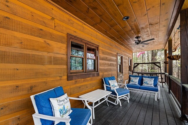 2487 Newport Dr, Ellijay, GA 30540 - wooden terrace featuring outdoor lounge area and a ceiling fan
