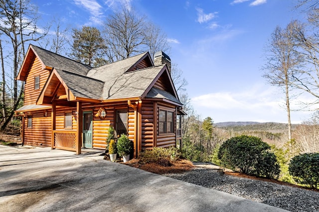 view of log-style house