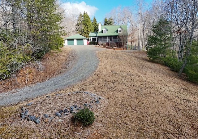 view of front of home with a garage and covered porch