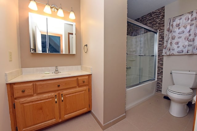 full bathroom with tile patterned flooring, enclosed tub / shower combo, vanity, and toilet