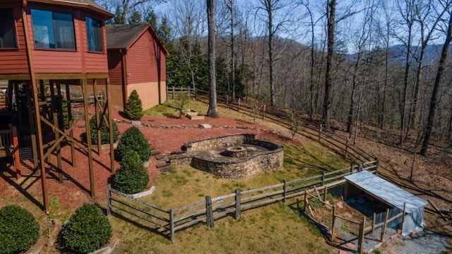 view of yard featuring a fire pit