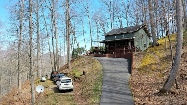 view of road with driveway