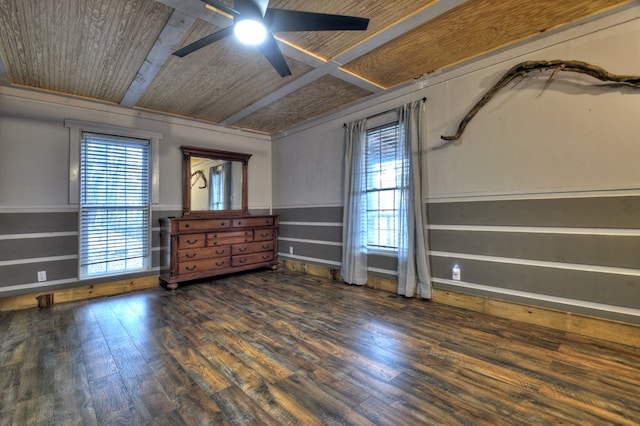 empty room with dark wood-type flooring, ceiling fan, and beam ceiling