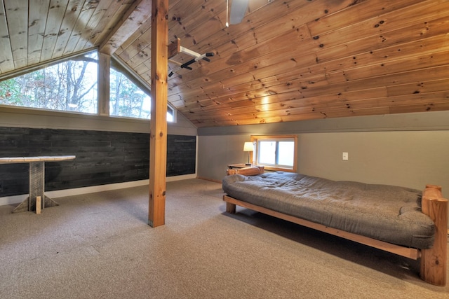 bedroom with multiple windows, wood ceiling, and carpet flooring