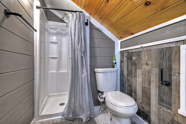 bathroom with wood walls, wood ceiling, toilet, and lofted ceiling