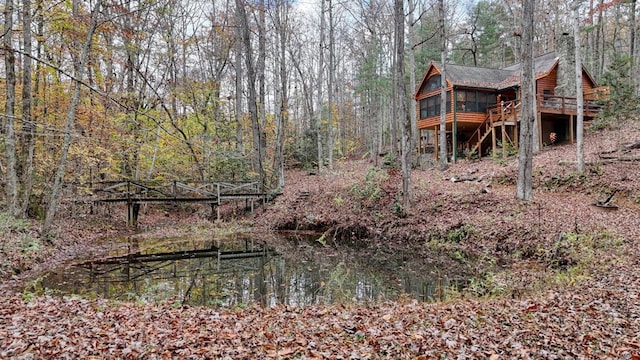 view of yard with a wooden deck