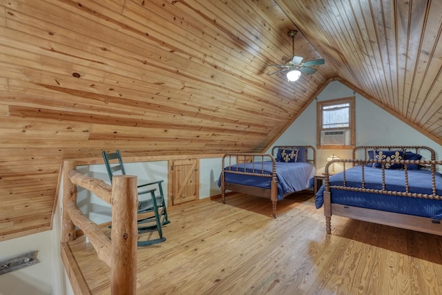 bedroom featuring cooling unit, wooden walls, light hardwood / wood-style floors, lofted ceiling, and wooden ceiling