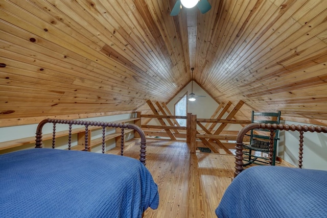 unfurnished bedroom featuring wood-type flooring, ceiling fan, lofted ceiling, and wooden ceiling