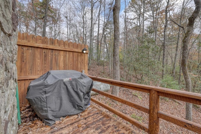 wooden deck with area for grilling