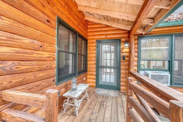 doorway to property featuring cooling unit