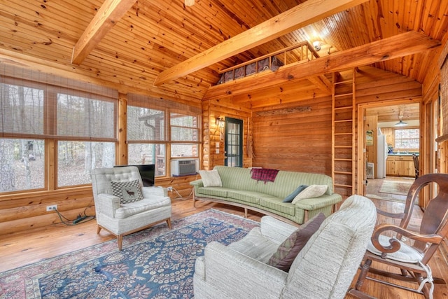 living room featuring cooling unit, vaulted ceiling with beams, wood walls, wood ceiling, and hardwood / wood-style floors