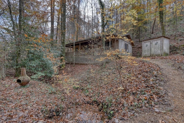 exterior space featuring a storage shed