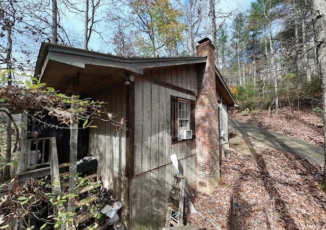 view of side of property with cooling unit