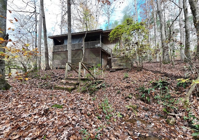 rear view of house with a deck