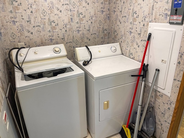 1716 Airport Rd, Marble, NC 28905 - clothes washing area featuring washer and dryer, electric panel, laundry area, and wallpapered walls