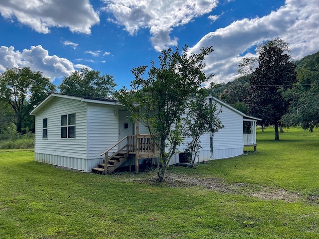 1716 Airport Rd, Marble, NC 28905 - back of house featuring a yard